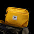The Condor Nomad Backpack 25L in olive green has a yellow mesh zippered pocket inside the lid with a Condor label—ideal for EDC or first responders.